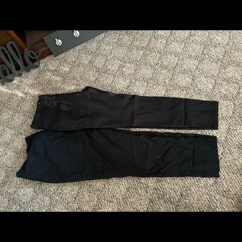 Two pairs of black trousers